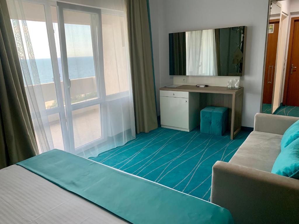 Postel nebo postele na pokoji v ubytování Hotel Meteor