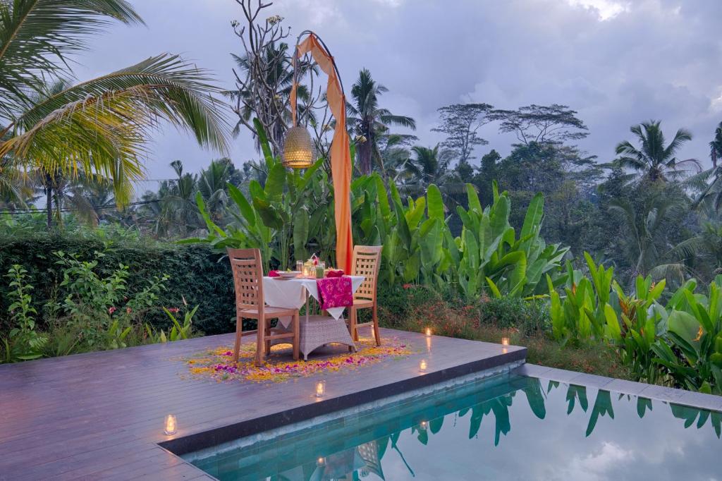 Bazén v ubytování Villa Tegal Tis Ubud nebo v jeho okolí