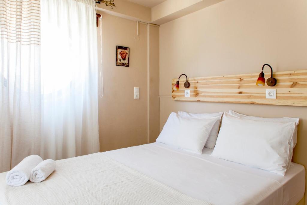 Postel nebo postele na pokoji v ubytování Estate Kares