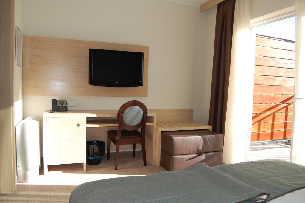 TV a/nebo společenská místnost v ubytování Hotel Mangart