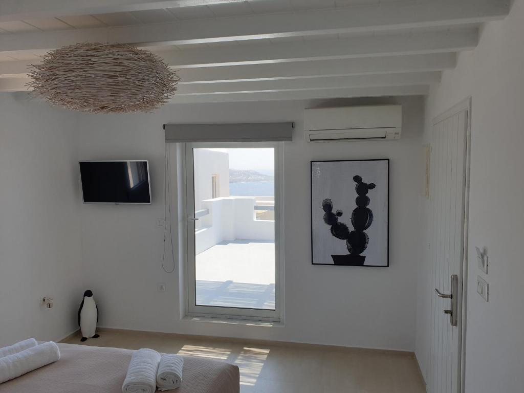 Postel nebo postele na pokoji v ubytování Bellou Suites