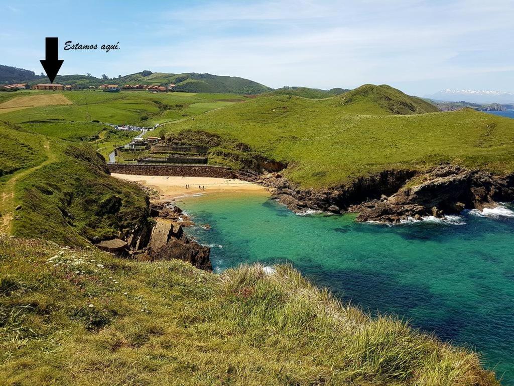 an aerial view of a beach on a hill at APARTAMENTOS EL SOLO in Santillana del Mar