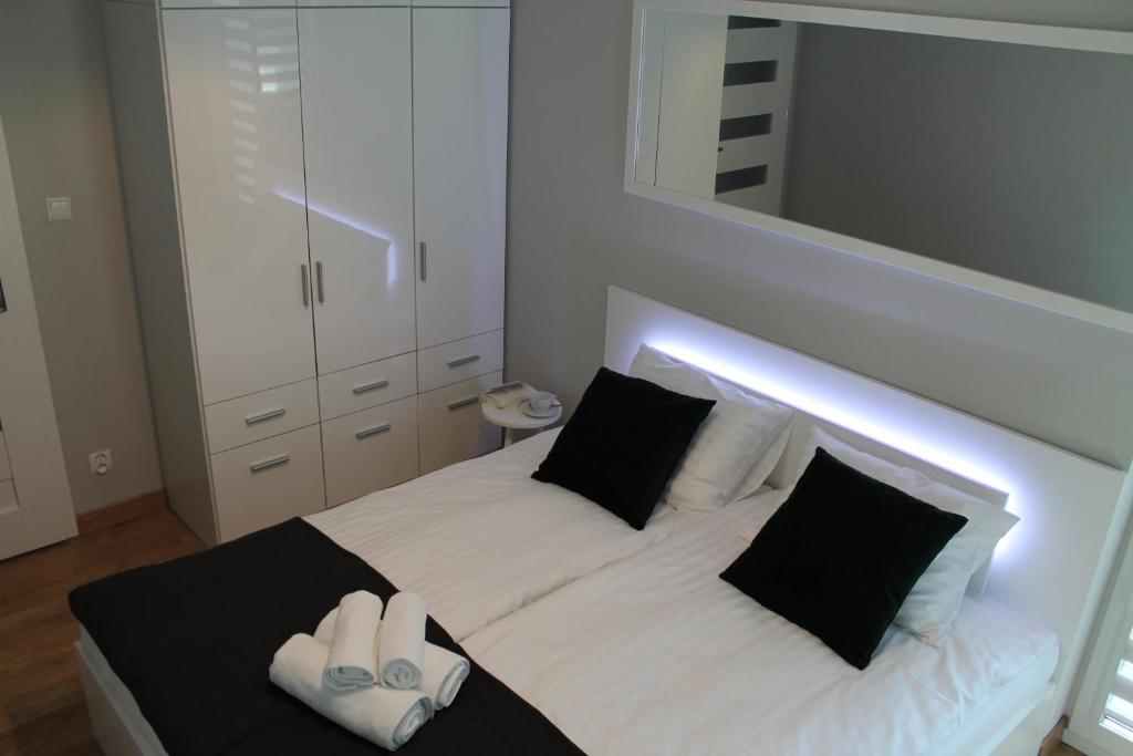 Postel nebo postele na pokoji v ubytování Dream Apartment