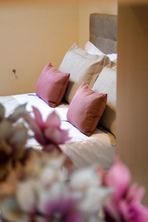 Postel nebo postele na pokoji v ubytování Anemi Superior Deluxe Suite