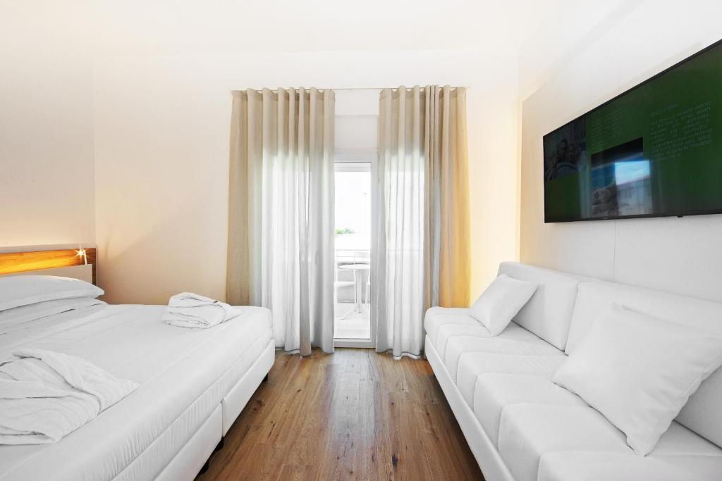 Postel nebo postele na pokoji v ubytování Toscana Charme Resort