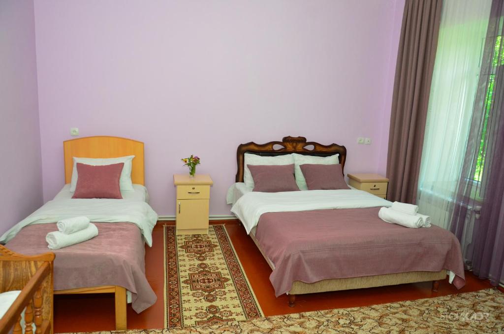 Postel nebo postele na pokoji v ubytování Narek B&B