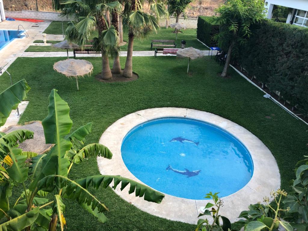 Bazén v ubytování Hotel Posada del Bandolero nebo v jeho okolí