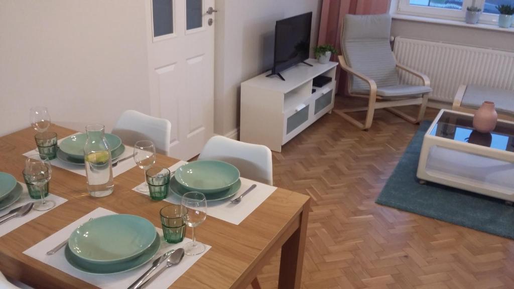 Televízia a/alebo spoločenská miestnosť v ubytovaní Apartamenty Premium 200m. do plaży