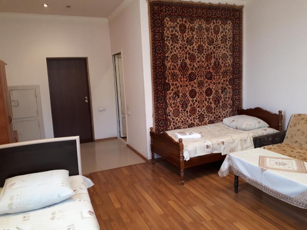 Postel nebo postele na pokoji v ubytování Hotel VIVAS