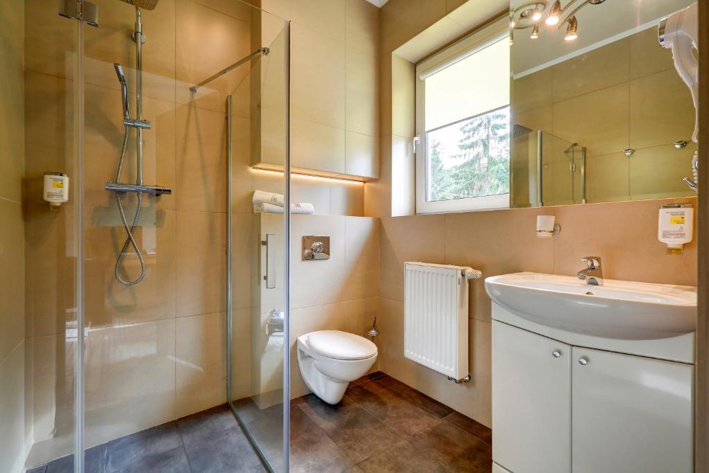Kúpeľňa v ubytovaní Hotel Afrodyta Business & Spa
