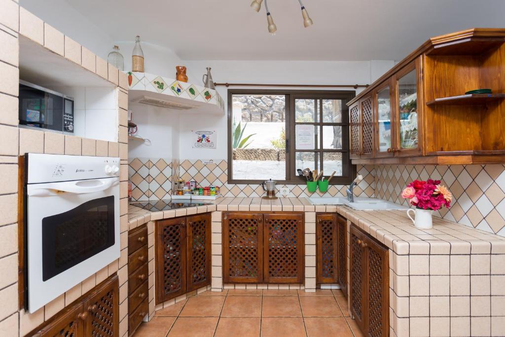 Kuchyň nebo kuchyňský kout v ubytování La Tortuga Hostel