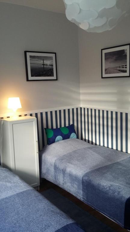 Posteľ alebo postele v izbe v ubytovaní Apartamenty Premium 200m. do plaży