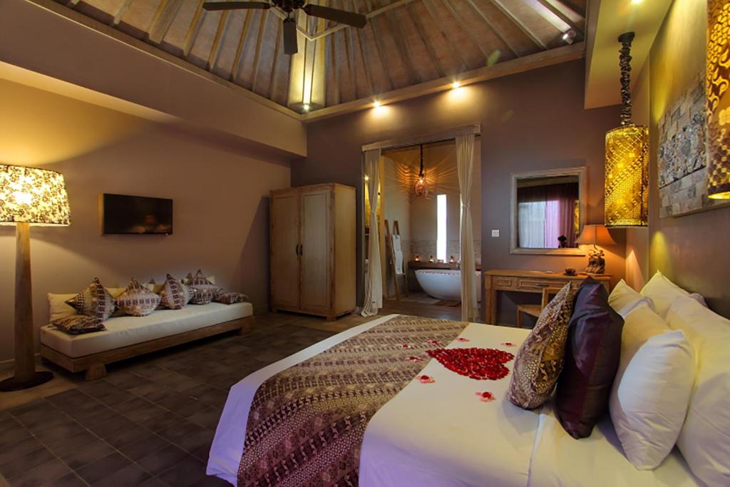 Una cama o camas en una habitación de MATHIS Retreat Ubud
