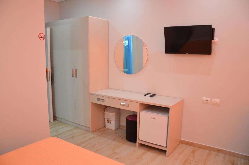 TV a/nebo společenská místnost v ubytování Hotel Beler