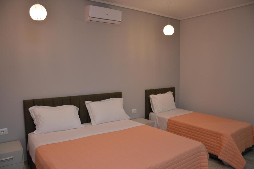 Postel nebo postele na pokoji v ubytování Hotel Beler
