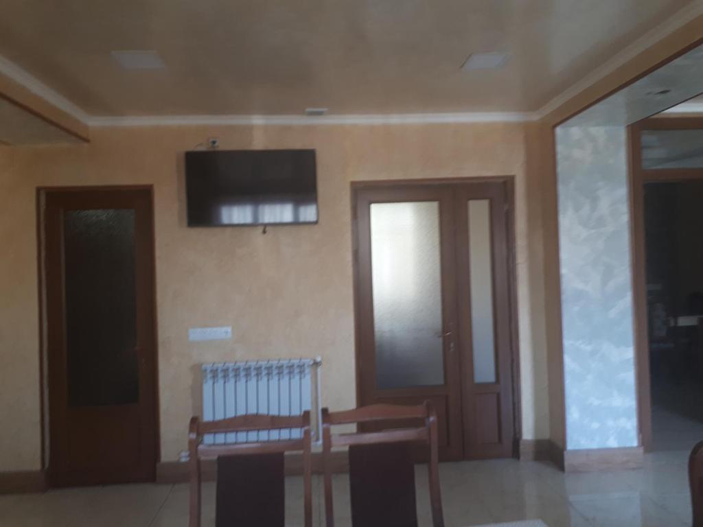 TV a/nebo společenská místnost v ubytování Hotel VIVAS