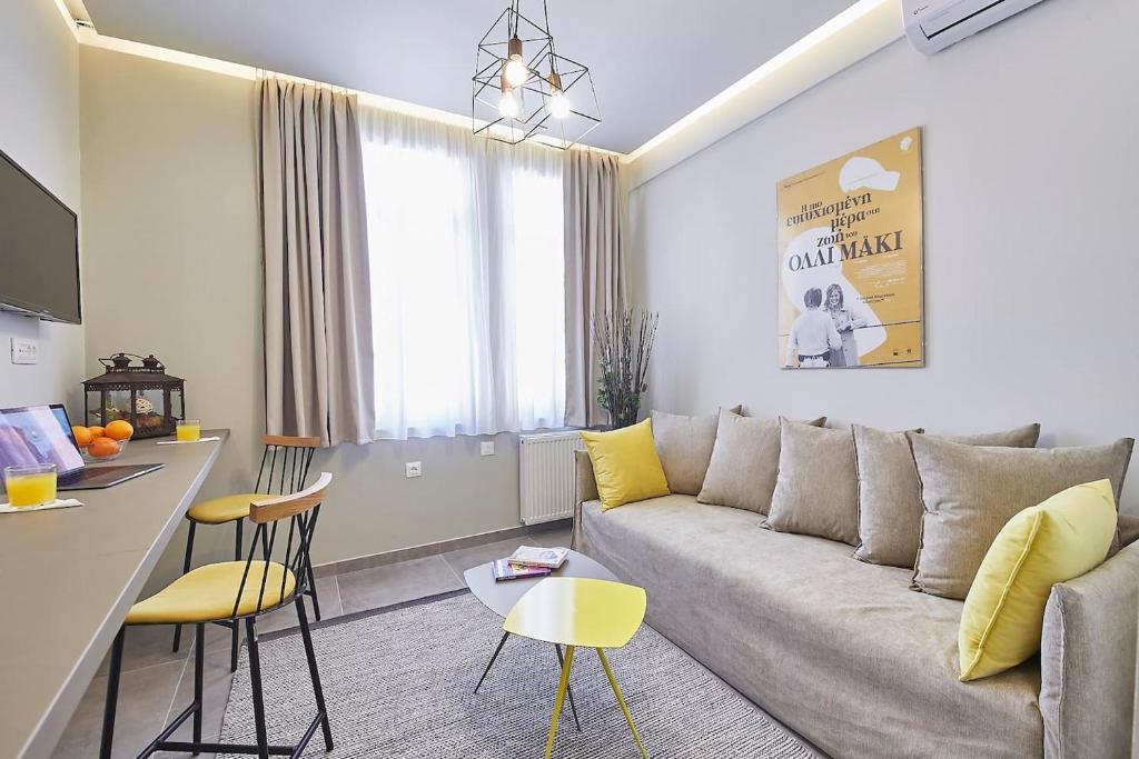 A seating area at Old Athens style 1bdr with Acropolis view rooftop!