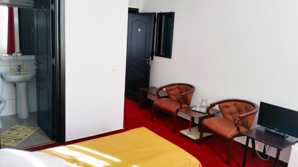 TV a/nebo společenská místnost v ubytování Hotel Teilor