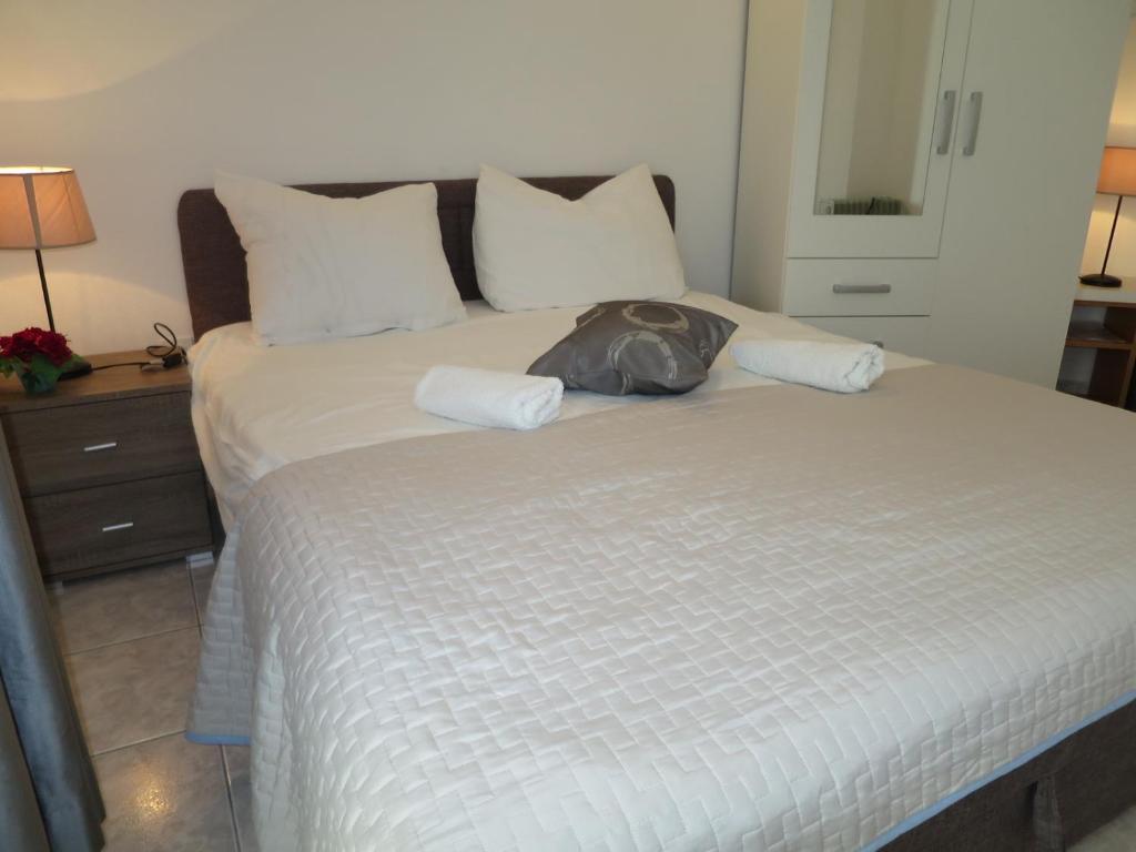 Posteľ alebo postele v izbe v ubytovaní Apartments Milica