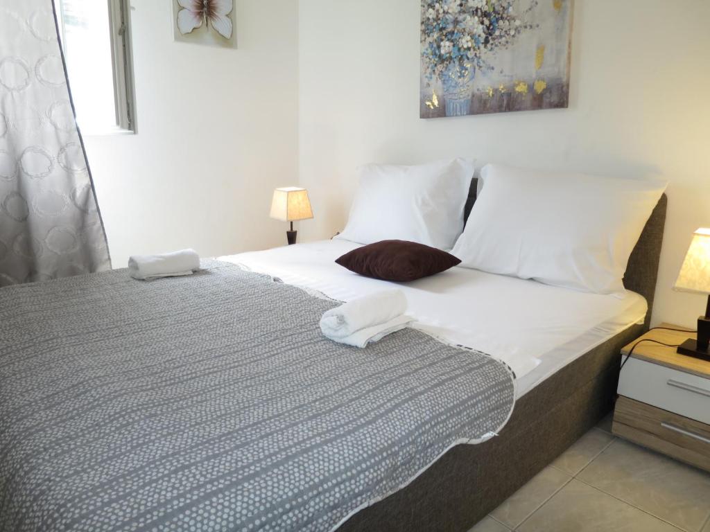Posteľ alebo postele v izbe v ubytovaní Apartments Milica
