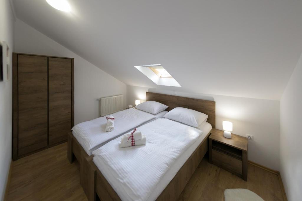 Posteľ alebo postele v izbe v ubytovaní House Smolčić