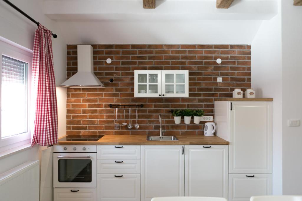 Kuchyňa alebo kuchynka v ubytovaní House Smolčić