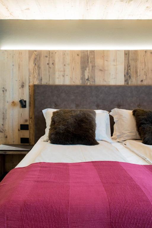 Postel nebo postele na pokoji v ubytování Hotel san Vitale