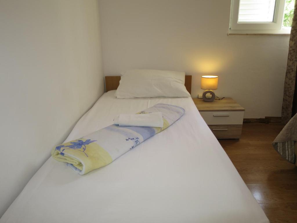 Posteľ alebo postele v izbe v ubytovaní Apartments Milica