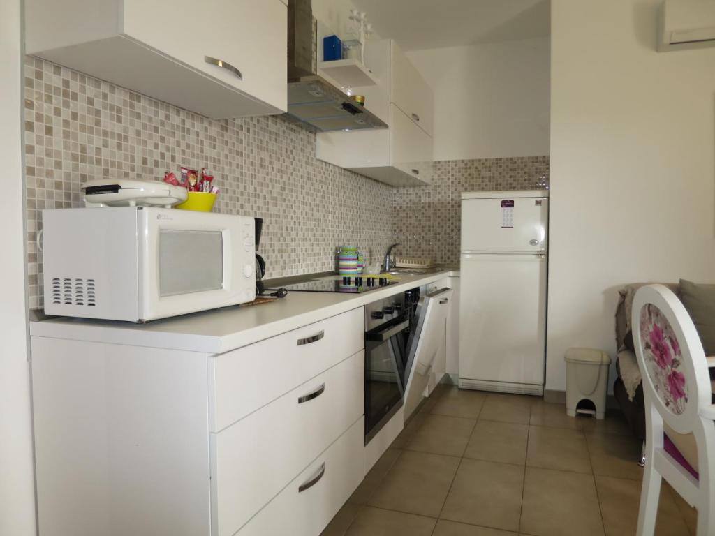 Kuchyňa alebo kuchynka v ubytovaní Apartments Milica