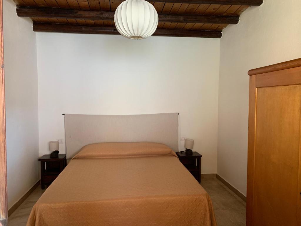 Postel nebo postele na pokoji v ubytování Arega B&B