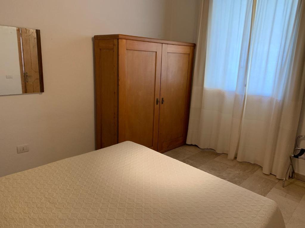 Postel nebo postele na pokoji v ubytování Arega B&B