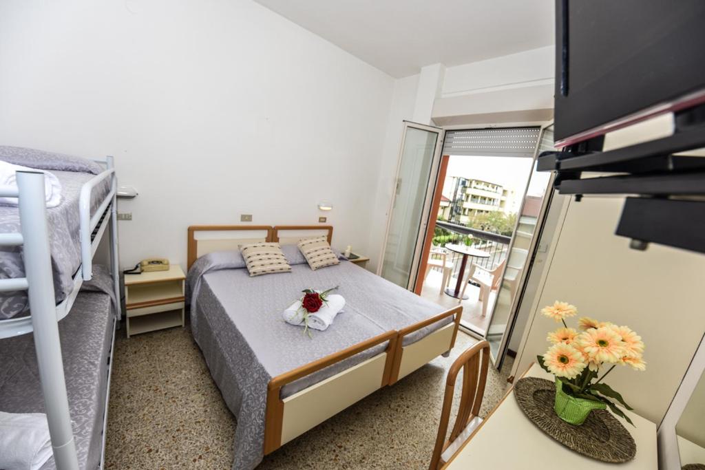 Postel nebo postele na pokoji v ubytování Hotel Caesar
