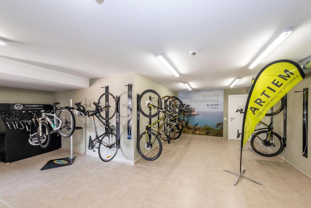 a bike shop with bikes on display in a room at ARTIEM Audax - Adults Only in Cala Galdana