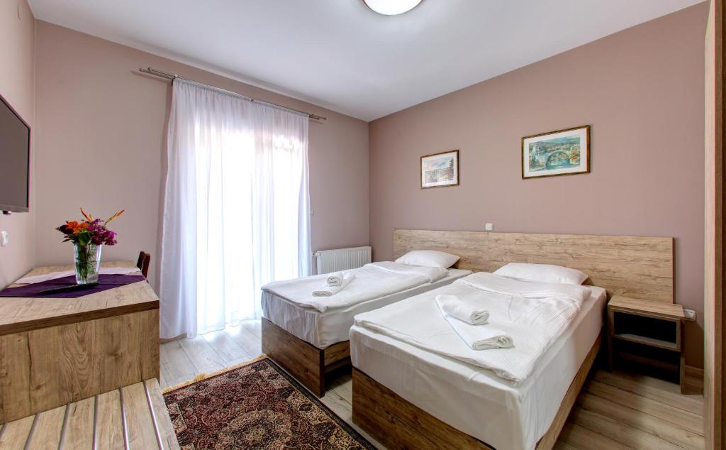 Postel nebo postele na pokoji v ubytování Motel MontaNaro