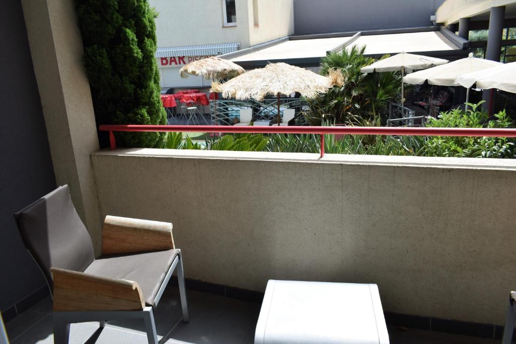 Balkón nebo terasa v ubytování Logis Hôtel La Fauceille