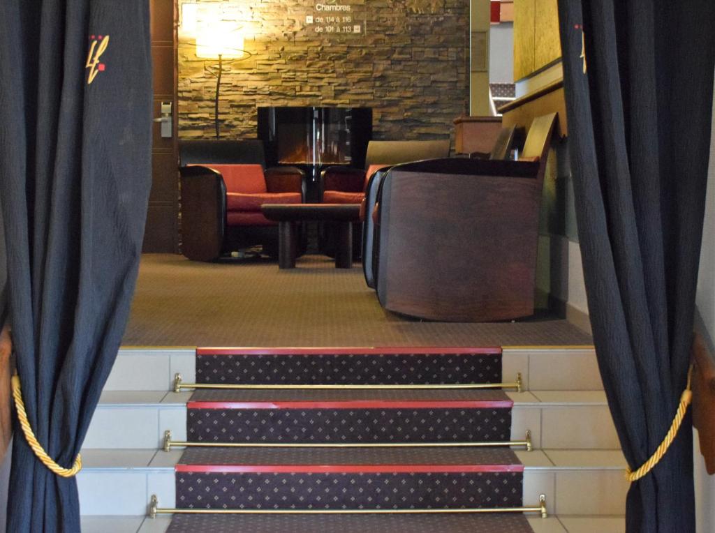 Posezení v ubytování Logis Hôtel La Fauceille