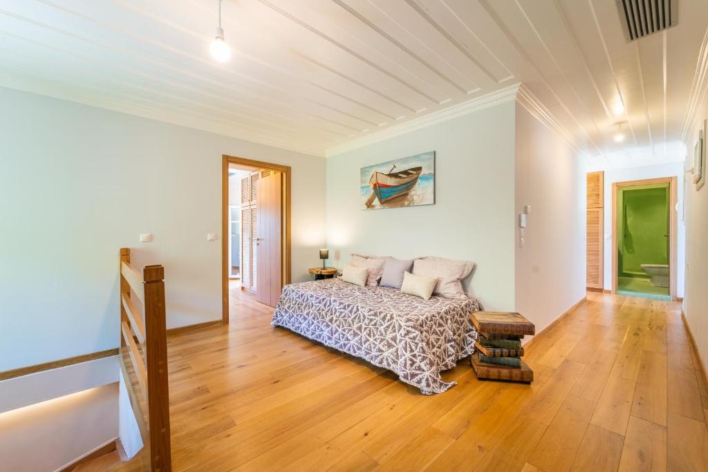 Postel nebo postele na pokoji v ubytování Siora Tanto Rustic Villa