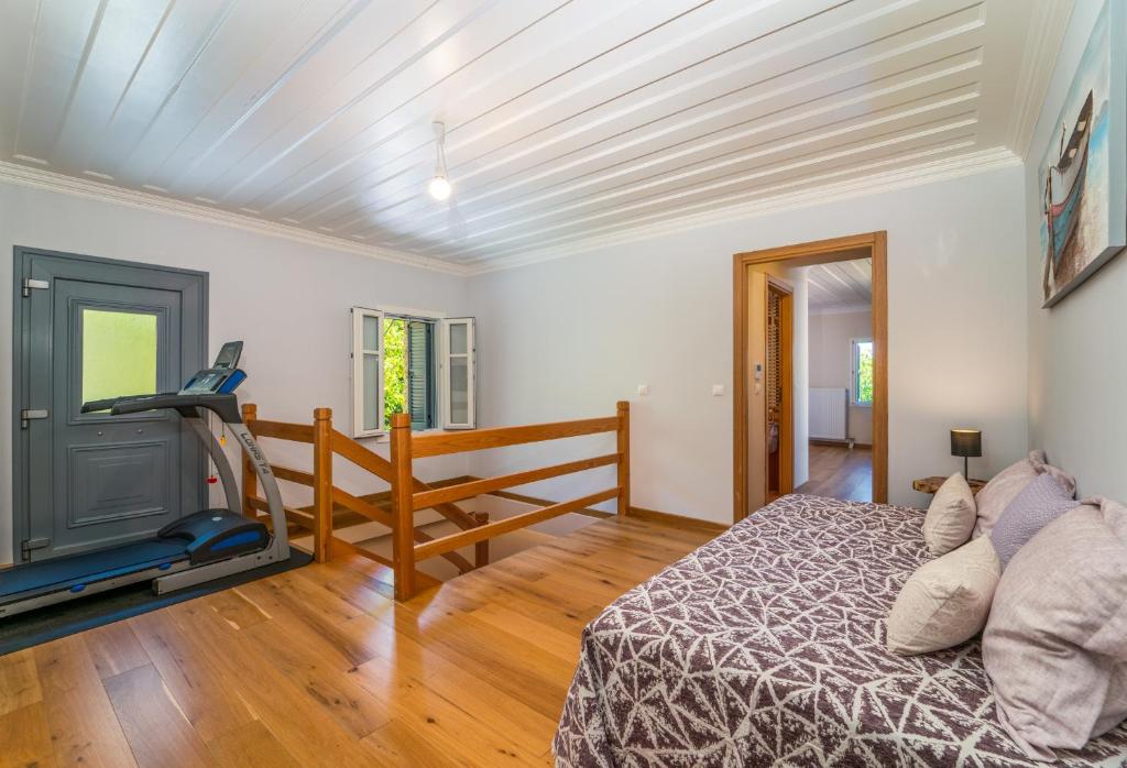 Postel nebo postele na pokoji v ubytování Siora Tanto Rustic Villa