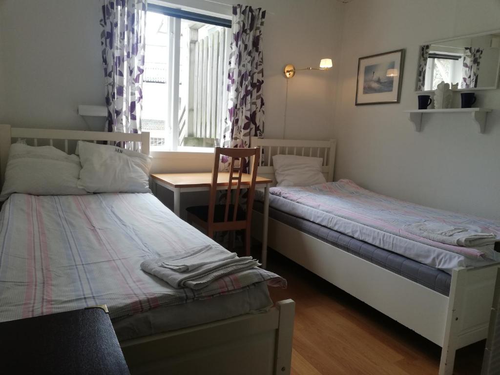 Postel nebo postele na pokoji v ubytování Bottna Inn
