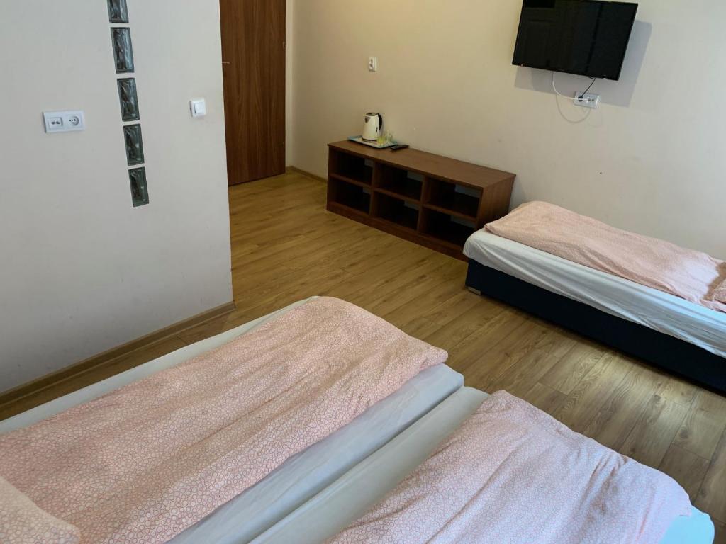 Posteľ alebo postele v izbe v ubytovaní Hostel4u
