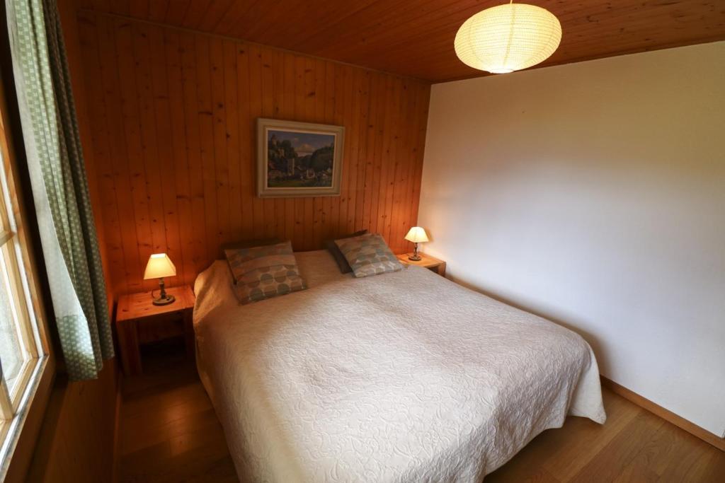 Postel nebo postele na pokoji v ubytování Rose de Noël