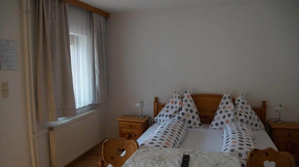 Postel nebo postele na pokoji v ubytování Weingut & Gästezimmer Pammer