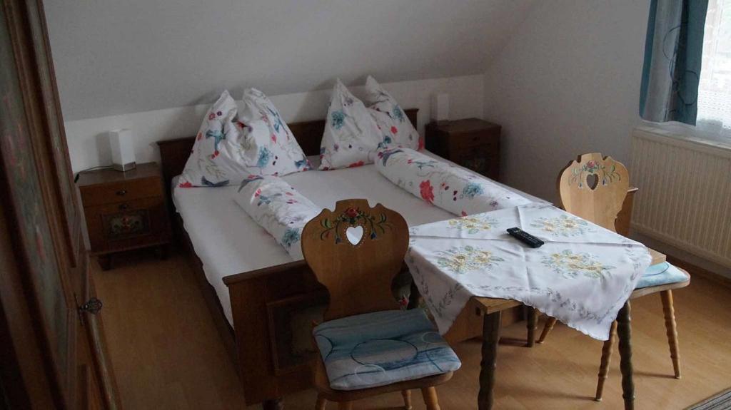 Postel nebo postele na pokoji v ubytování Weingut & Gästezimmer Pammer
