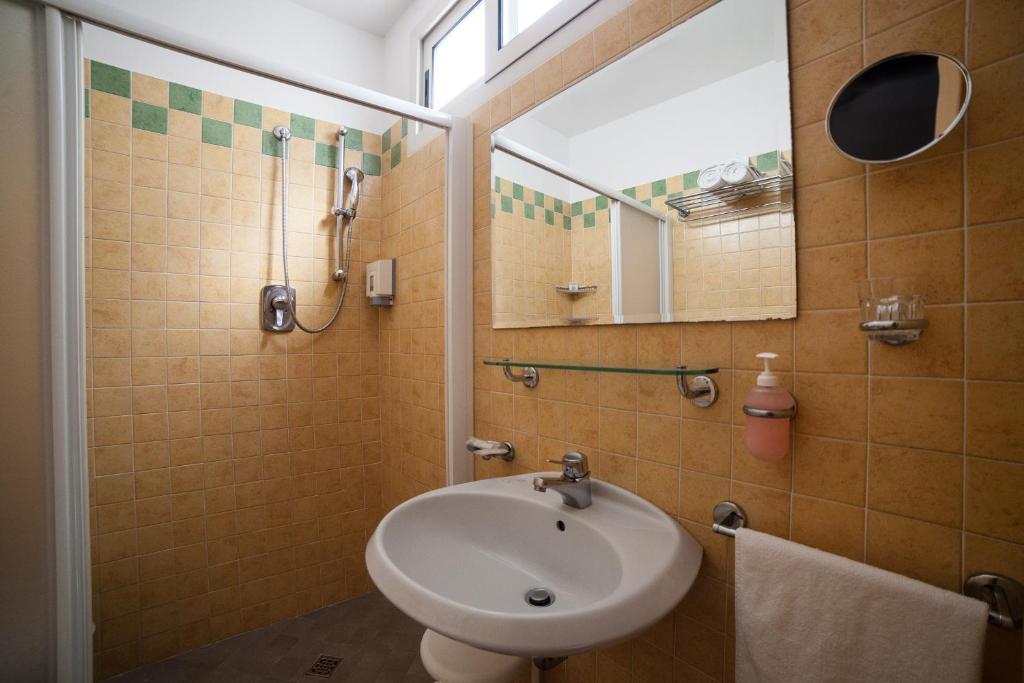 Koupelna v ubytování Hotel Plaza