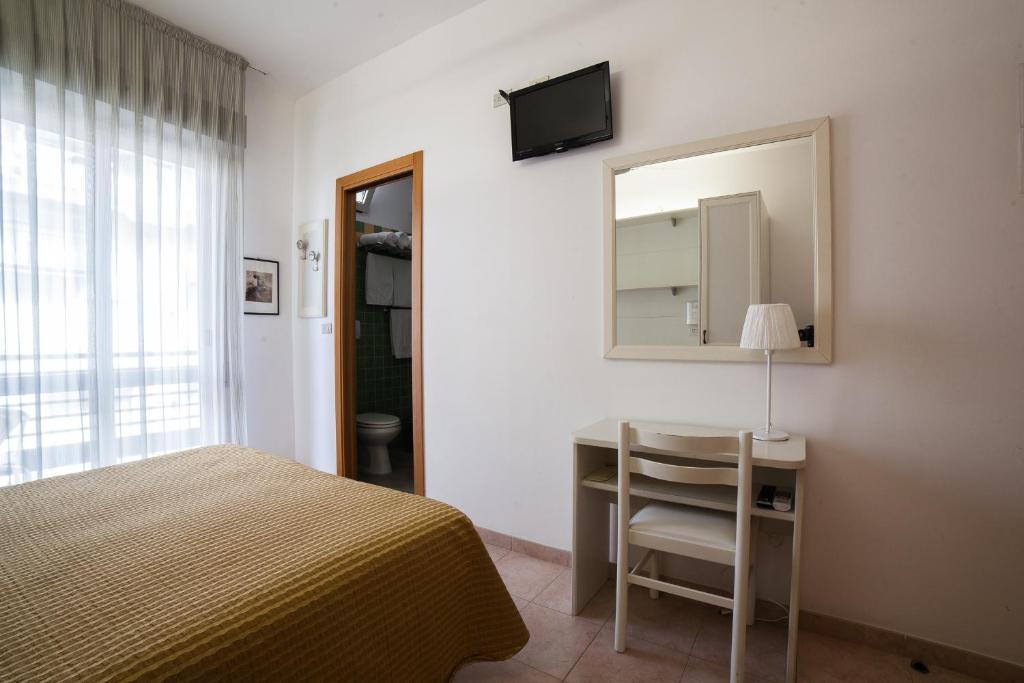 TV a/nebo společenská místnost v ubytování Hotel Plaza