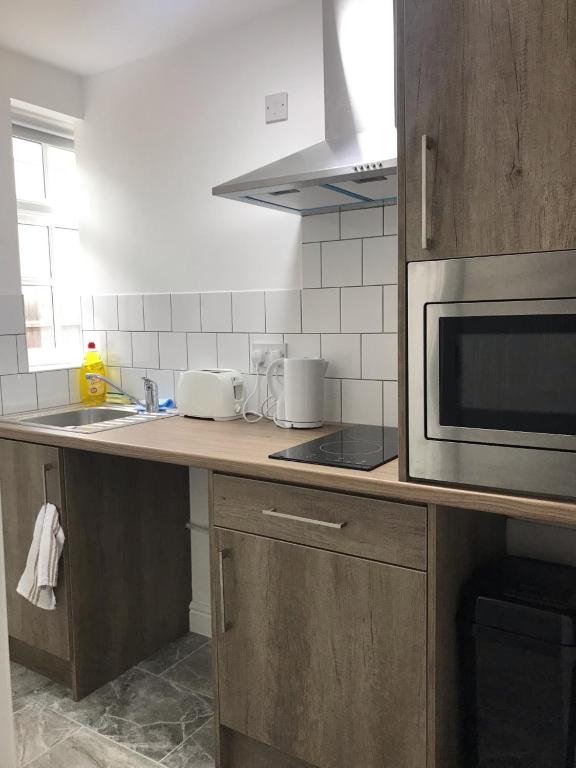 Kuchyň nebo kuchyňský kout v ubytování Lancaster Place Apartments