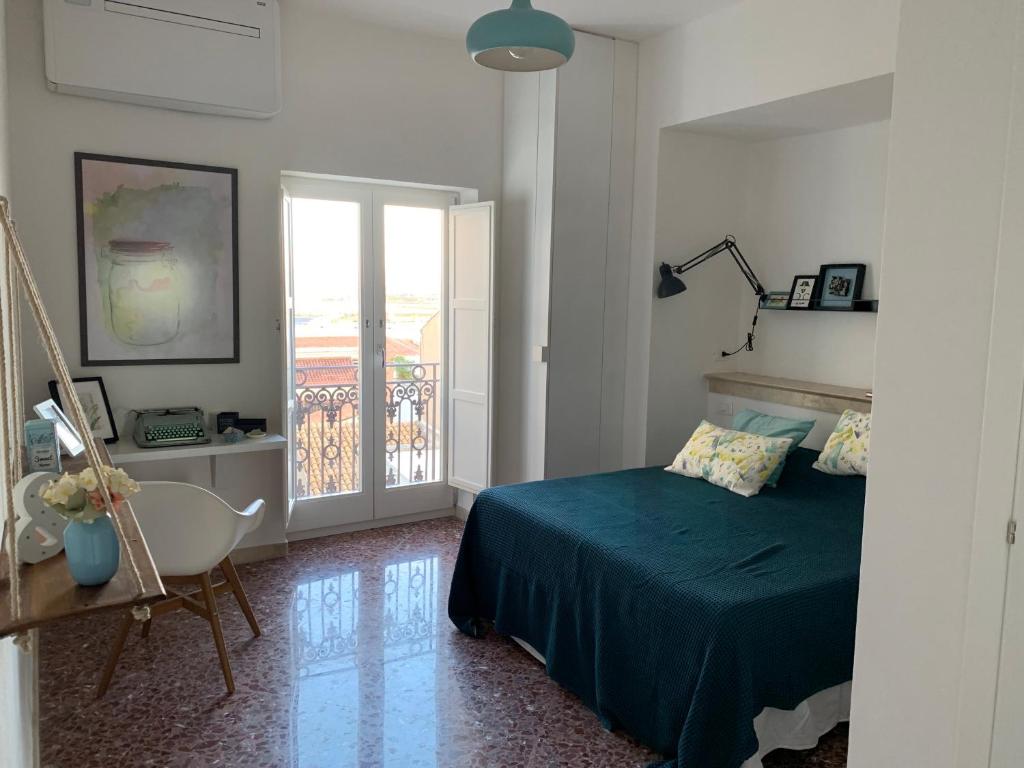 Ένα ή περισσότερα κρεβάτια σε δωμάτιο στο Casa VerbaVolant