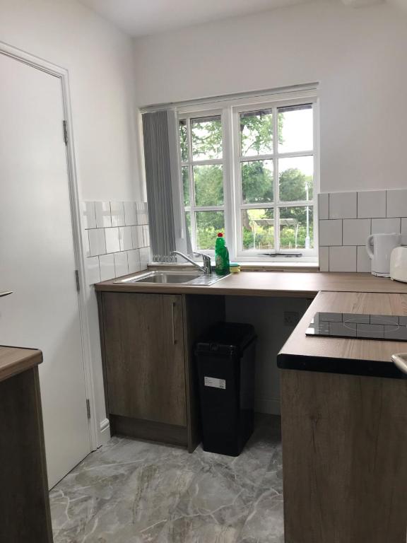 Kuchyň nebo kuchyňský kout v ubytování Lancaster Place Apartments