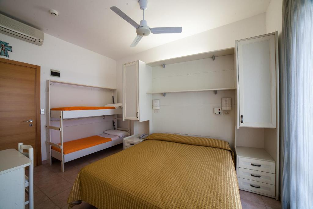 Postel nebo postele na pokoji v ubytování Hotel Plaza