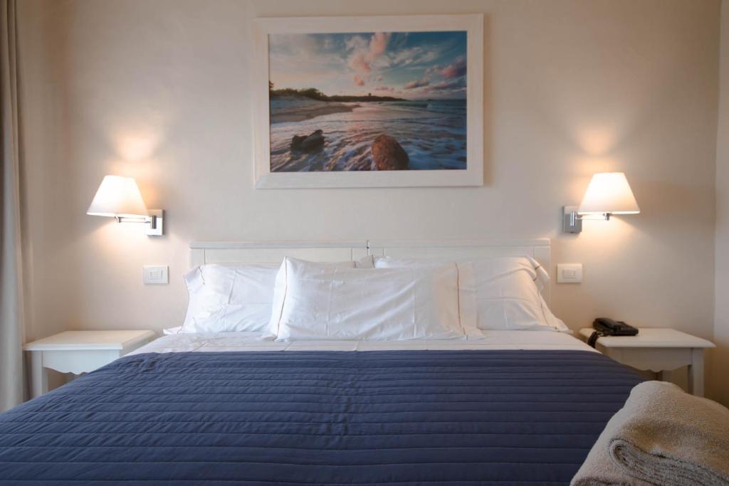 Postel nebo postele na pokoji v ubytování Hotel Nibaru